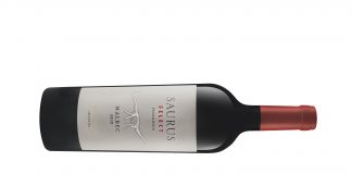 Un Saurus Patagónico en la copa para celebrar al Malbec en su día